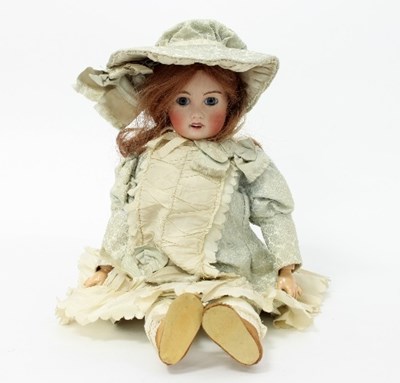 Lot 450 - A Limoges bisque head doll, stamped...