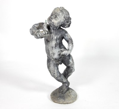 Lot 560 - A lead fountainhead figure of a putto with...