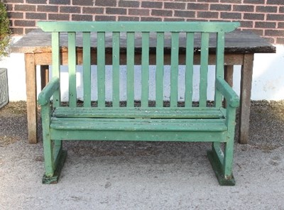 Lot 564 - A painted wooden garden bench and a wooden table