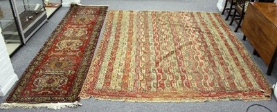 Lot 568 - A Turkish carpet, the field of multiple wavy...