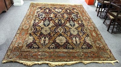 Lot 569 - An Agra style carpet, the central field of...