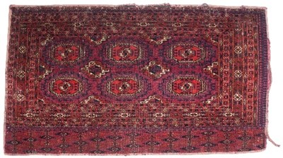 Lot 572 - An Eastern rug, the central field of six...