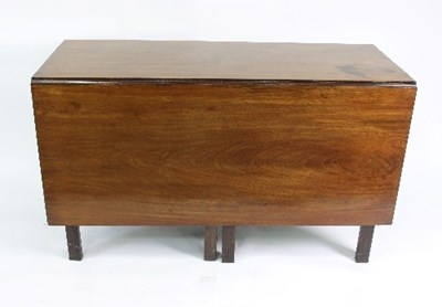 Lot 581 - A mahogany drop-leaf table, circa 1800, with...