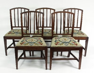 Lot 582 - A set of five mahogany dining chairs with...