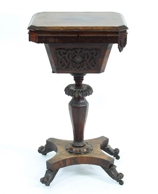 Lot 590 - A Victorian rosewood work table, the hinged...