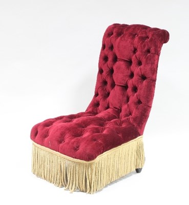 Lot 597 - A Victorian button back nursing chair with red...