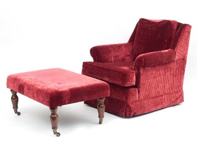 Lot 619 - An easy chair upholstered in red corduroy and...