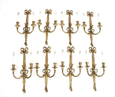 Lot 621 - A set of eight Louis XVI style two-branch wall...