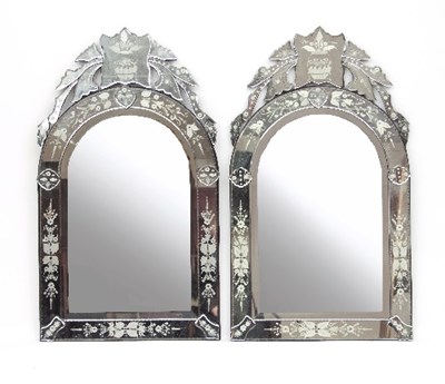 Lot 623 - A pair of Venetian engraved mirror framed...