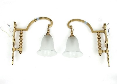 Lot 624 - A pair of brass single-light wall lights with...