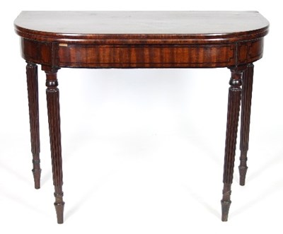 Lot 635 - A Regency mahogany D-shaped tea table on...