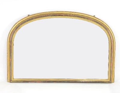 Lot 638 - A Victorian arch top overmantel mirror with...