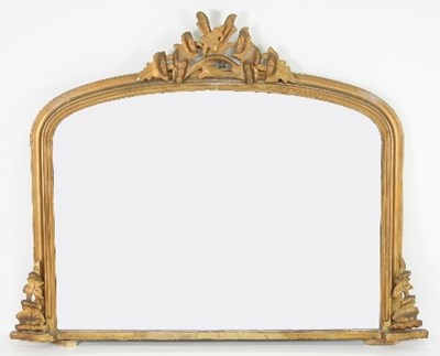 Lot 641 - A Victorian arch top overmantel with moulded...