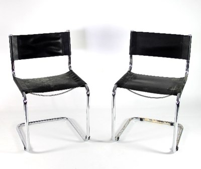 Lot 667 - A pair of tubular chrome cantilever chairs...