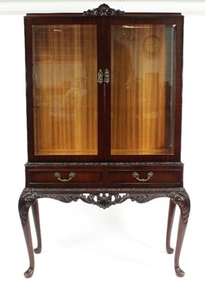 Lot 690 - A display cabinet by Chechik Ltd., the glazed...