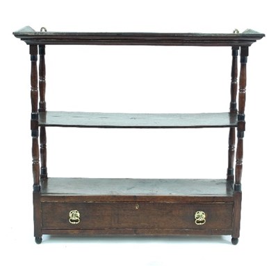 Lot 693 - A George III oak two-tier hanging wall shelf...