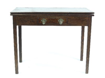 Lot 694 - A George III oak tea table with frieze drawer,...