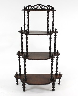 Lot 695 - A Victorian burr walnut graduated four-tier...