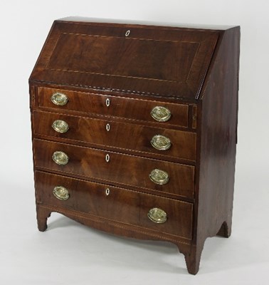 Lot 701 - A George III mahogany bureau, fitted beneath...