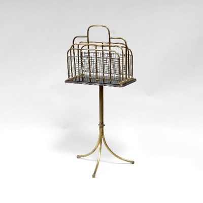 Lot 707 - An Edwardian gilt brass magazine stand, the...