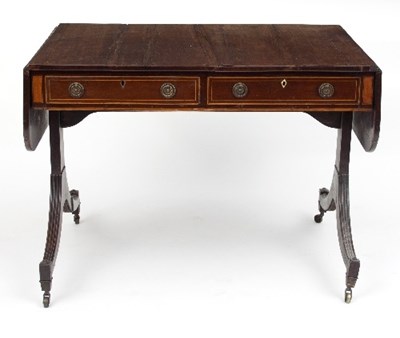 Lot 715 - A Regency mahogany sofa table, fitted two...