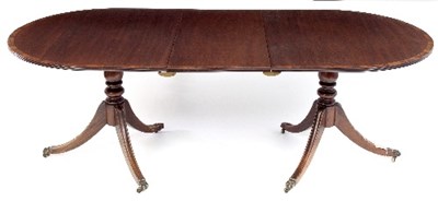 Lot 717 - A Regency style mahogany twin pedestal dining...