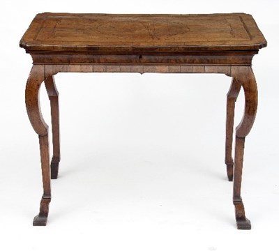 Lot 721 - A Queen Anne walnut veneered table, the hinged...