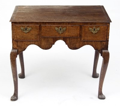 Lot 722 - A George II oak lowboy, fitted three drawers...