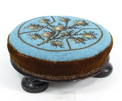 Lot 736 - A Victorian circular beadwork stool, raised on...