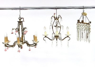 Lot 778 - A six-branch chandelier hung with ceramic...