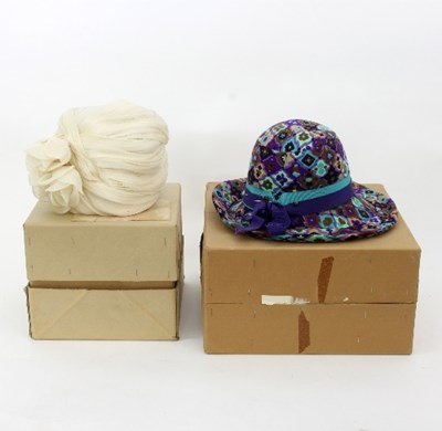 Lot 798 - A lady's cream silk floral hat with floral...