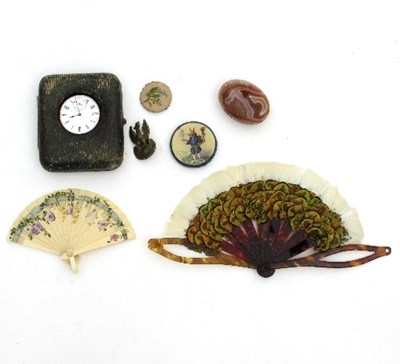 Lot 804 - A small feather fan with tortoiseshell sticks,...