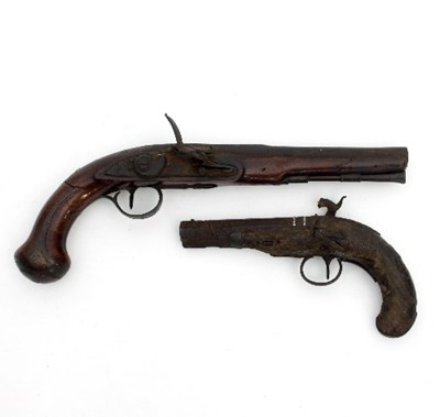 Lot 806 - A 19th Century pistol with walnut grip, inset...