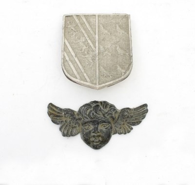 Lot 855 - An alabaster coat-of-arms and a small lead...