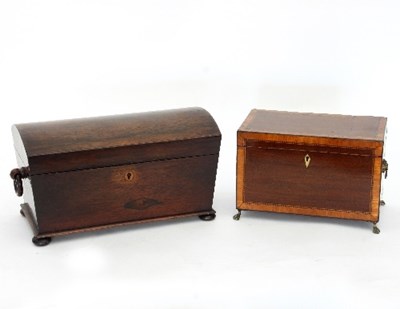 Lot 874 - A Regency rosewood tea caddy with domed cover...