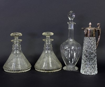 Lot 26 - A pair of cut glass ships decanters and...