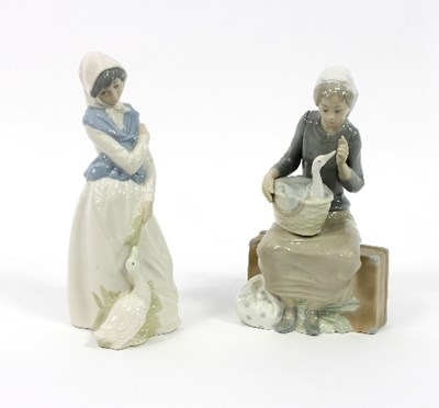 Lot 35 - Two Lladro figures, goose girls, 29cm and 27cm...