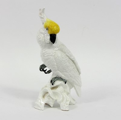 Lot 49 - A Crown Staffordshire cockatoo by J T Jones...