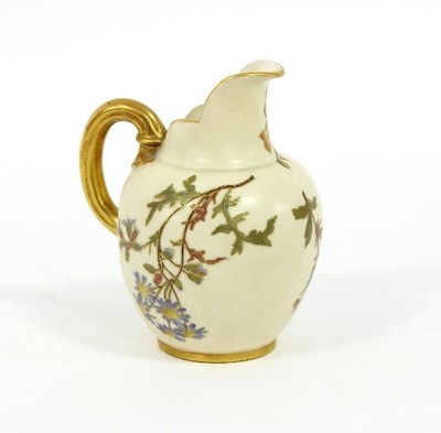 Lot 53 - A Royal Worcester jug decorated flowers on an...