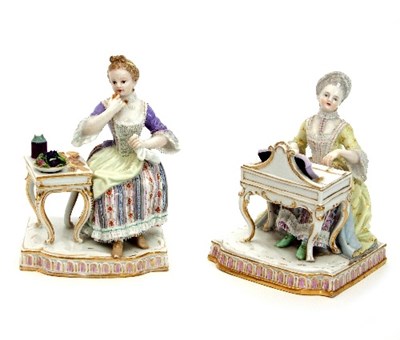 Lot 54 - A pair of Meissen figures of the senses, one...