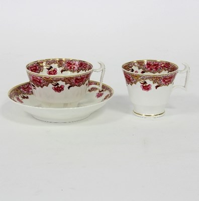 Lot 66 - A Spode trio painted in puce, 3073 red printed...