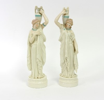 Lot 72 - A pair of Bing & Grondahl porcelain figures of...