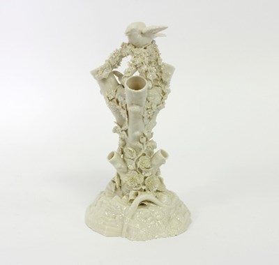 Lot 73 - A Belleek spill vase, modelled as a flower...