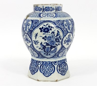 Lot 81 - An 18th Century Dutch delft baluster vase with...