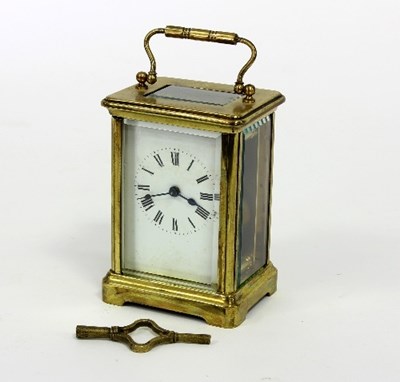 Lot 99 - A gilt brass cased carriage clock, the dial...