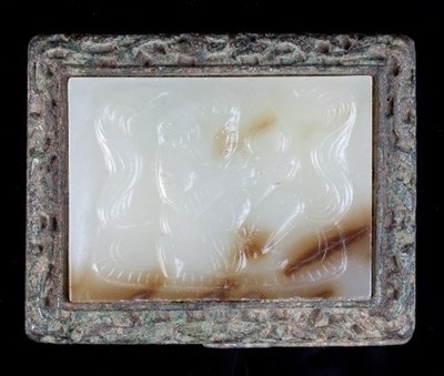 Lot 116 - A Chinese white jade buckle plaque, the...