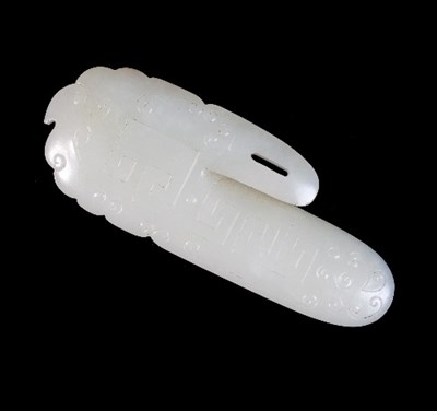 Lot 117 - A Chinese white jade pendant, of stylised oval...