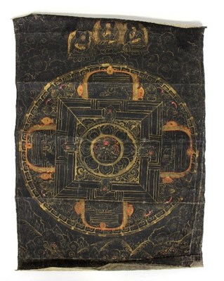 Lot 125 - A Tibetan thanka, with painted and gilded gods...