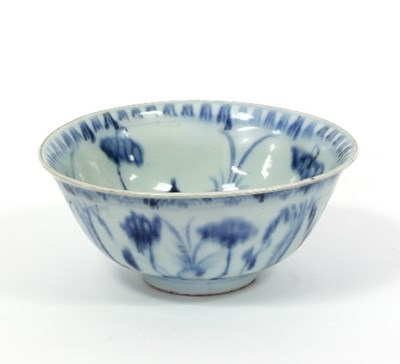 Lot 150 - A Chinese provincial blue and white bowl, Ming...