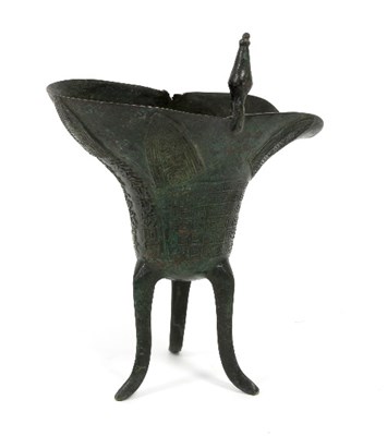 Lot 156 - A Chinese bronze libation cup of archaic form...